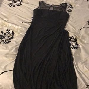 Black SCARLET dress size 12 half slit in the front